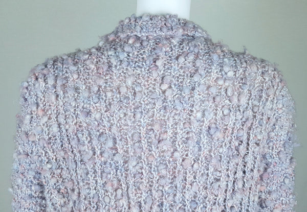 Close-up back view showing the rounded neckline and dimensional hand-knit texture of a Vintage 1990s Pastel Popcorn-Knit Open-Front Cardigan 