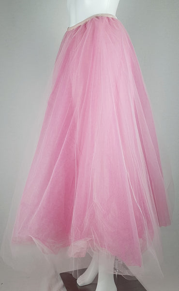 Full side view of a vintage 1990s RALPH Ralph Lauren pink tulle maxi skirt with a voluminous layered silhouette displayed on a mannequin