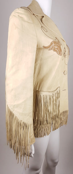 Full three quarter view of a Vintage 1940s Geronimo Longhorn Fringed Leather Western Jacket displayed on a mannequin