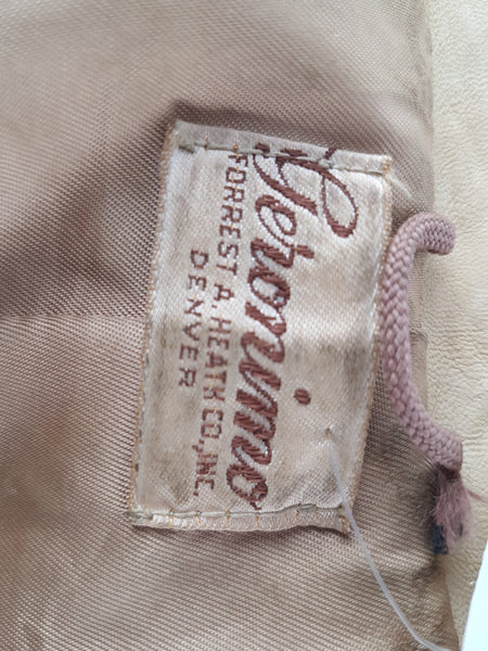 Close-up of the fabric label reading Geronimo, Forrest A. Heath Co., Inc., Denver.
