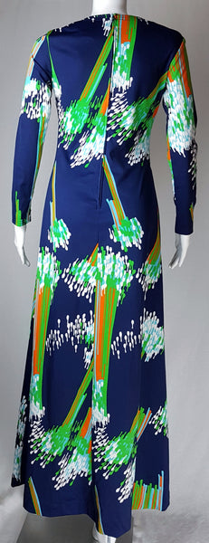 Full back view of a vintage 1970s Lanvin navy maxi dress with a V-neck, long sleeves and a vivid abstract print displayed on a mannequin
