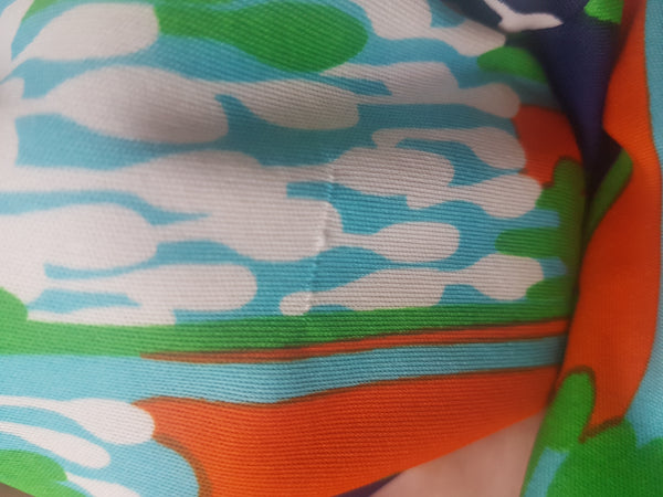 Condition close-up showing a minor fabric snag on the inner sleeve of the vintage Lanvin dress.