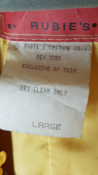 Close-up of the Rubie’s Costume Co. New York label marked Exclusive of Trim, Dry Clean Only and Large.