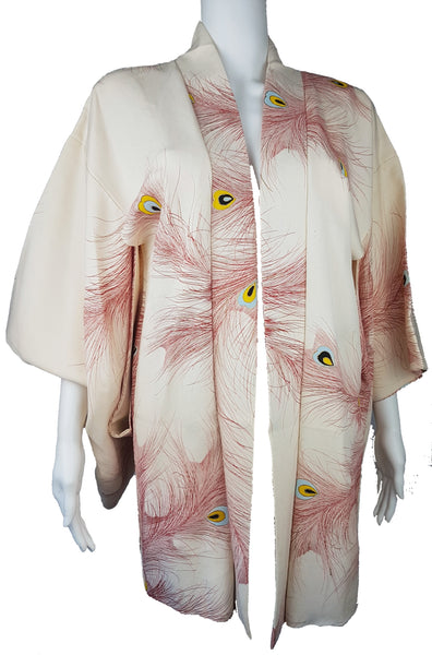 Vintage 1950s to 1960s Japanese haori on a mannequin, featuring red peacock feather motifs with blue, yellow, black and metallic gold details - front view