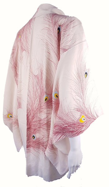 Vintage 1950s to 1960s Japanese haori on a mannequin, featuring red peacock feather motifs with blue, yellow, black and metallic gold details - back view