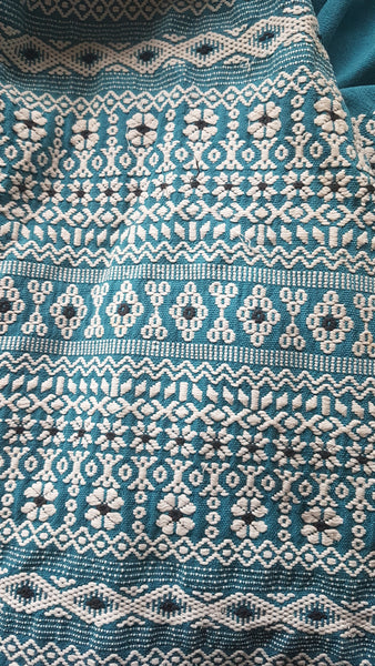 Vintage 1950s Mayan Modern Guatemalan cotton skirt in rich blue and white with traditional geometric woven motifs displayed on a mannequin - detailed motif view