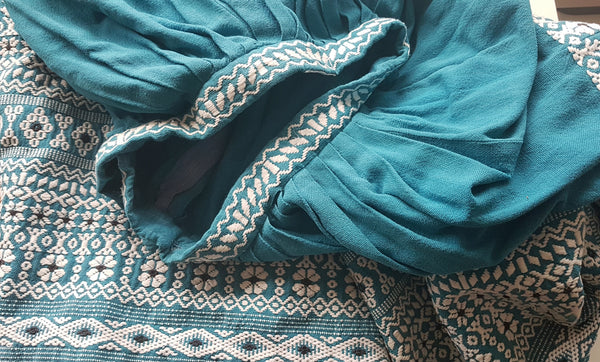 Vintage 1950s Mayan Modern Guatemalan cotton skirt in rich blue and white with traditional geometric woven motifs displayed on a mannequin - detailed motif and waistband view