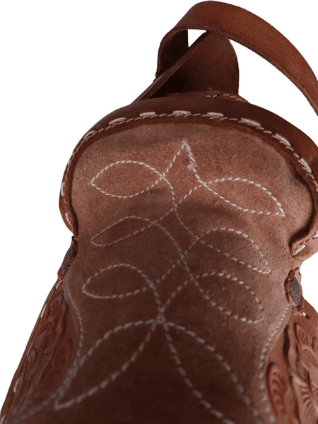 Stitching view of a vintage 1960s Mexican tooled-leather crossbody bag constructed as a miniature Western horse saddle 