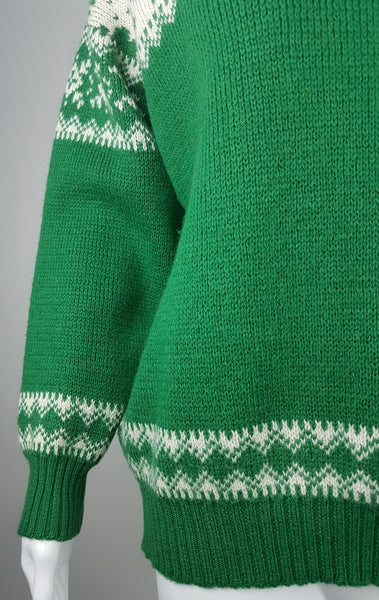 Vintage 1970s - 1980s Blarney Castle Irish fisherman’s green wool sweater with white shamrock and patterns on a mannequin