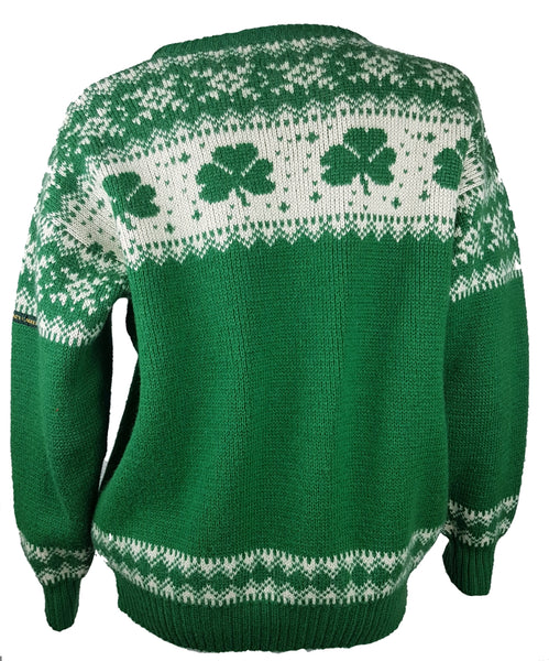 Vintage 1970s - 1980s Blarney Castle Irish fisherman’s green wool sweater with white shamrock and patterns on a mannequin