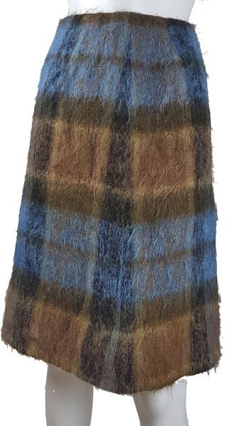 Vintage 1970s Andrew Stewart mohair and wool pencil skirt with a fuzzy plaid pattern in blue, brown, grey, and olive shown on mannequin