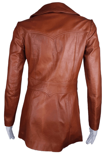 Full Back view showing the jacket’s shaped waist, panelled construction and subtly flared hip-length hem