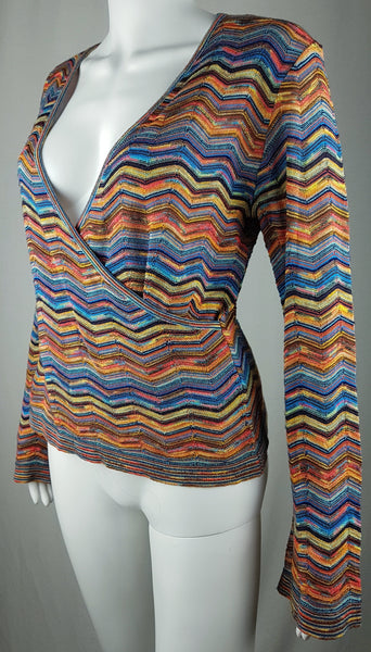 Three-quarter front view of a vintage 1990s Holt Renfrew multicolour faux-wrap knit top with a deep V-neckline.