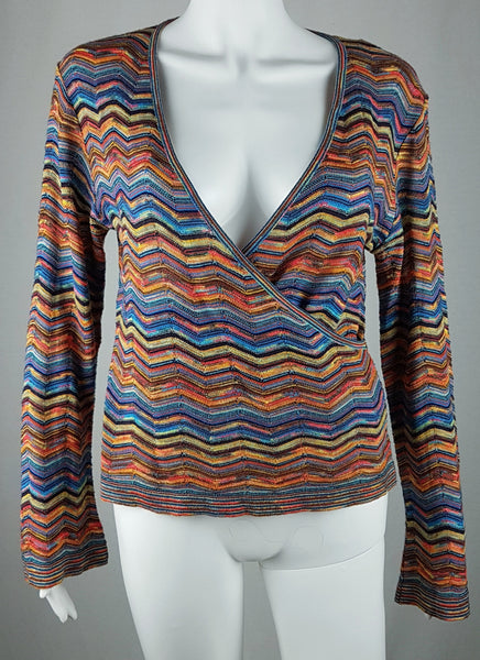 Full front product view of a vintage 1990s Holt Renfrew multicolour chevron-knit faux-wrap top with long sleeves and a deep V-neckline displayed on a mannequin