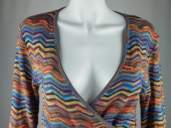 Close-up of the deep V-neckline and fixed crossover front on a vintage 1990s Holt Renfrew chevron-knit top.