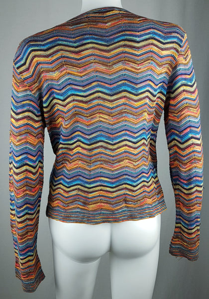Full back view of a vintage 1990s Holt Renfrew chevron-knit top with long sleeves, a fitted waist and straight hip-length hem.