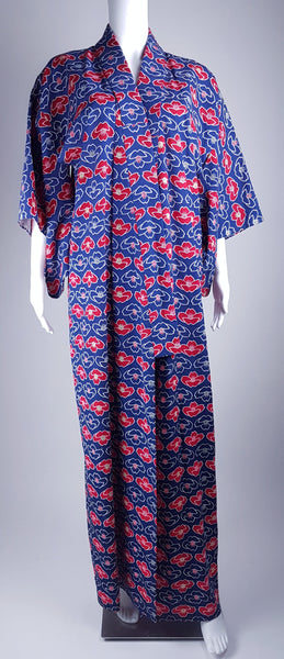 Vintage hand-stitched full-length Japanese cotton kimono displayed on a mannequin, with a bold blue, red and white lotus flower print - front view