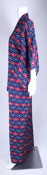 Vintage hand-stitched full-length Japanese cotton kimono displayed on a mannequin, with a bold blue, red and white lotus flower print - side view