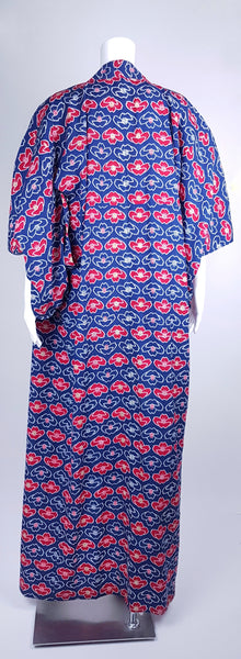 Vintage hand-stitched full-length Japanese cotton kimono displayed on a mannequin, with a bold blue, red and white lotus flower print - back view