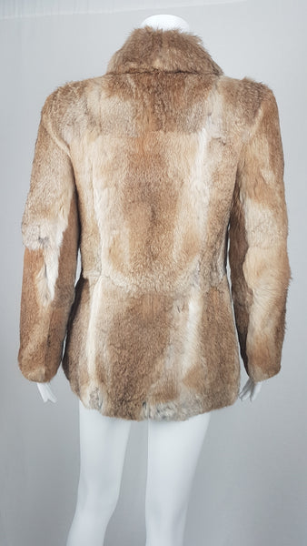 Vintage late 1980s to early 1990s brown rabbit fur jacket on a mannequin with a wide collar without the leather tie belt - back view