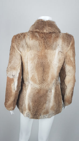 Vintage late 1980s to early 1990s brown rabbit fur jacket on a mannequin with a wide collar without the leather tie belt - back view