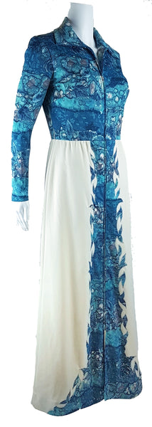 Vintage 1970s Missy House of Canada maxi dress with an aqua blue patterned bodice, long sleeves, pointed collar, and a white skirt with coordinating abstract panels shown on a mannequin