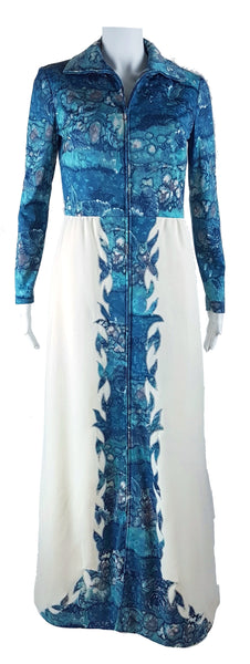 Vintage 1970s Missy House of Canada maxi dress with an aqua blue patterned bodice, long sleeves, pointed collar, and a white skirt with coordinating abstract panels shown on a mannequin